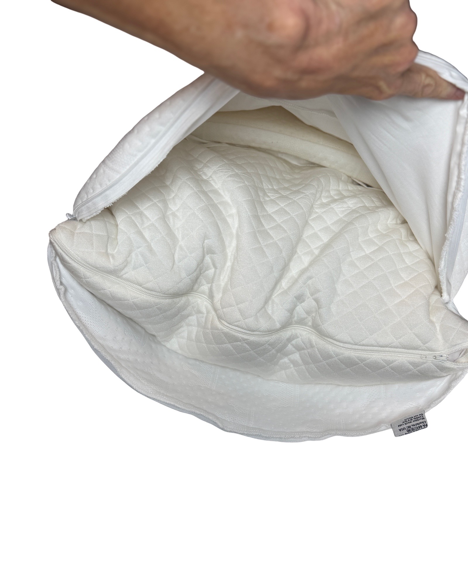 Crown Lift® support cores being placed inside a pillow