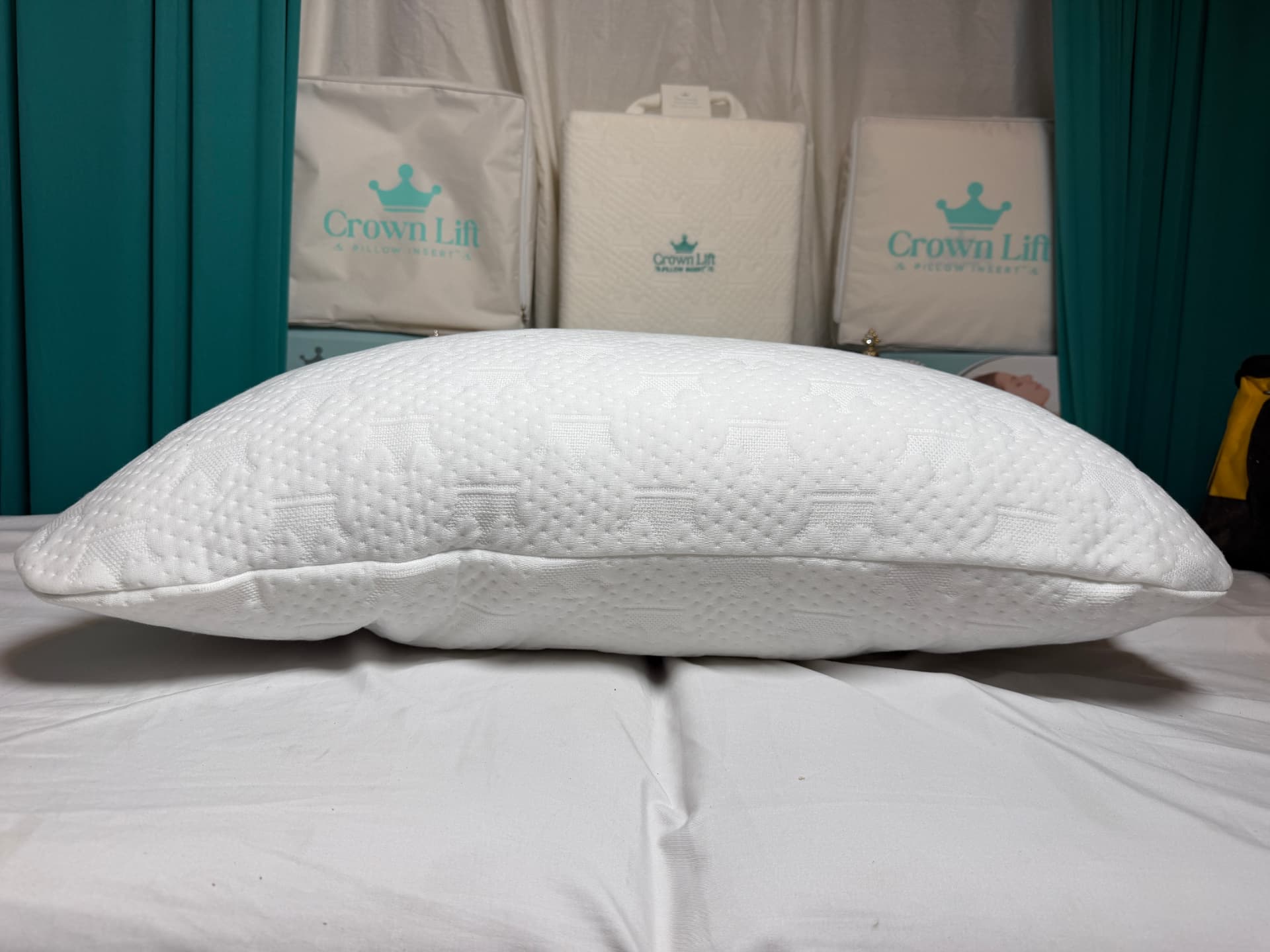Side profile of a pillow holding its full loft with a Crown Lift support core inside